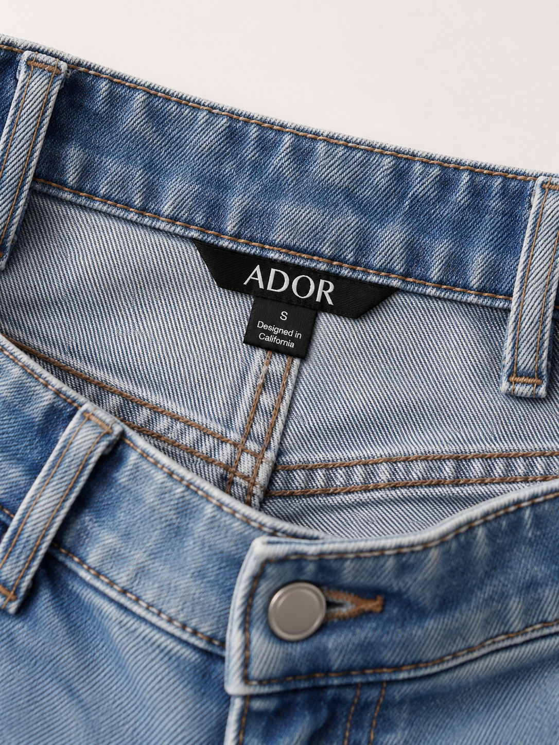 ADOR brand label detail on Stretch Flared Jeans High Waist Frayed Hem Denim Pants