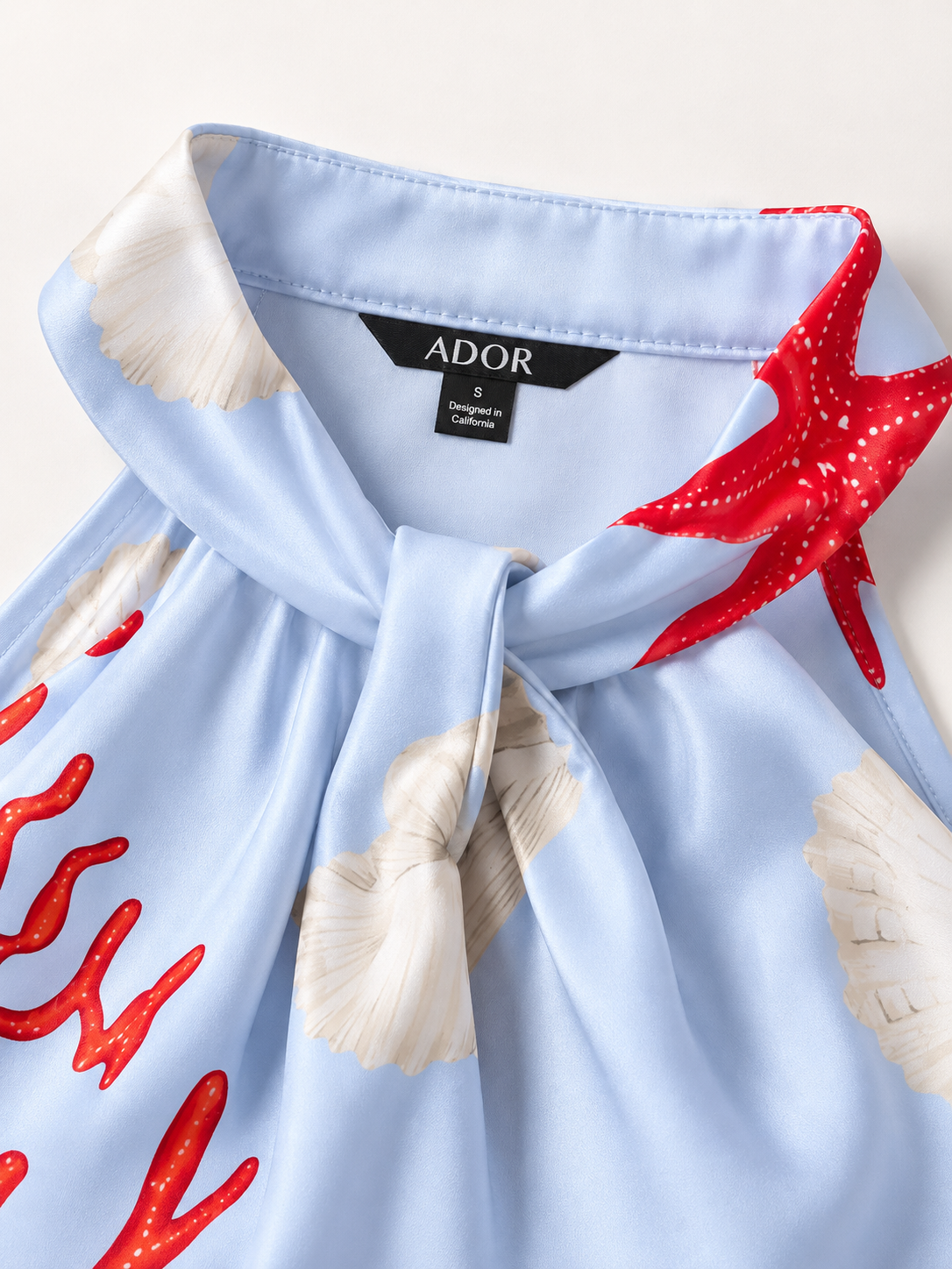 ADOR brand label detail on Satin Ocean-Inspired Pattern Print Vacation-Style Set
