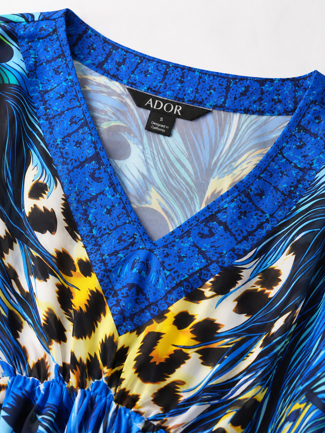 ADOR brand label detail on Jungle Wild Party Flowy Chiffon Leopard Kaftan