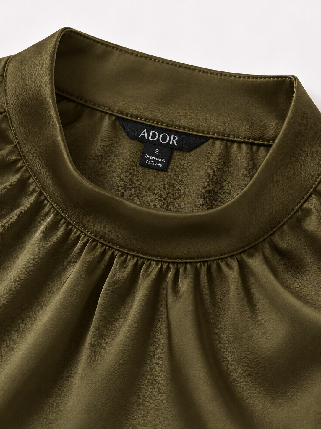 ADOR brand label detail on Hawaii Palm Silky Satin Sleeveless Top