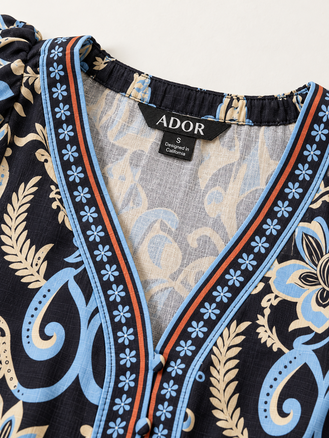 ADOR brand label detail on Summer Night Palm Linen-Style A-Line Dress
