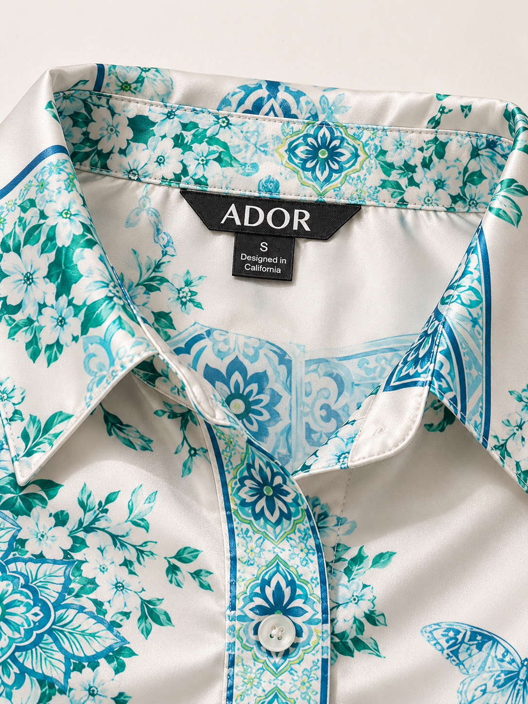 ADOR brand label detail on Celadon Bloom Story Silky Satin Button Down Oversized Shirt