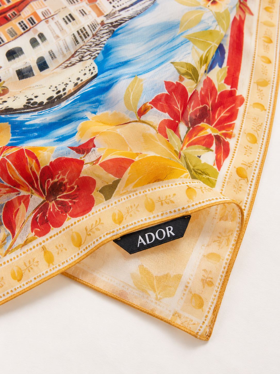 ADOR brand label detail on Santorini Summer Flowy Chiffon Square Scarf