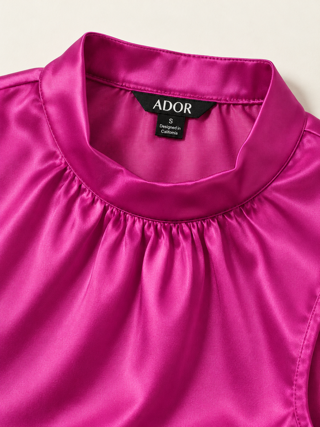 ADOR brand label detail on Satin Stand Collar Wide Shoulder Sleeveless Top