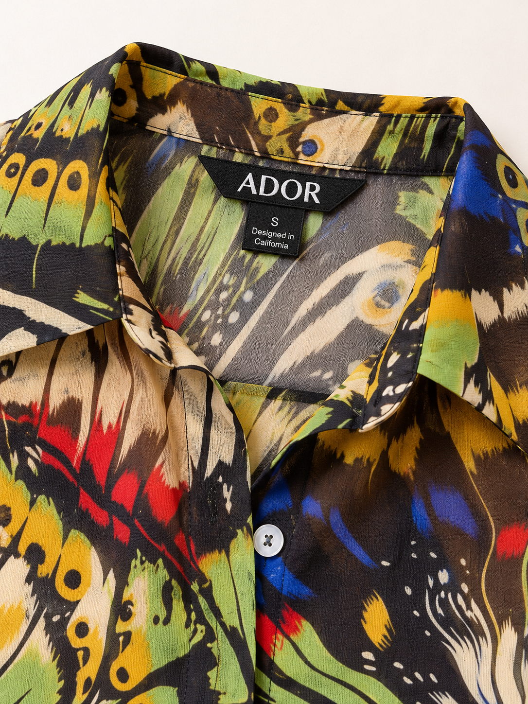 ADOR brand label detail on Jungle Butterfly Flowy Chiffon Blouse