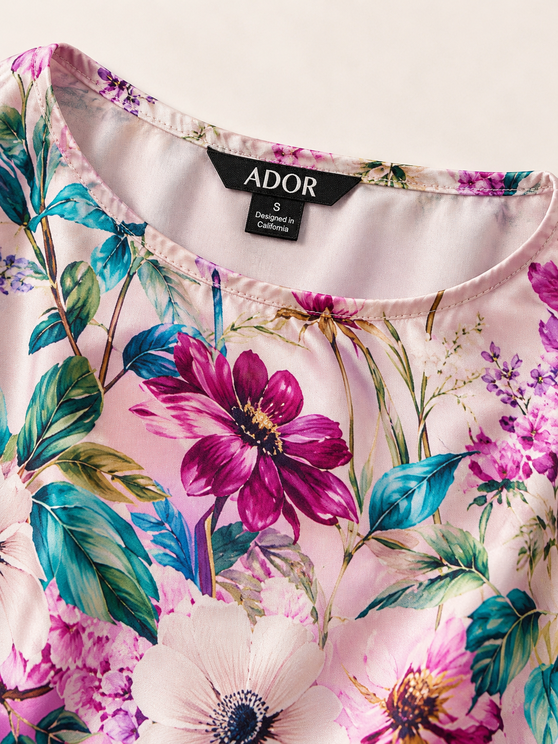 ADOR brand label detail on Pastel Garden Silky Satin Batwing Top