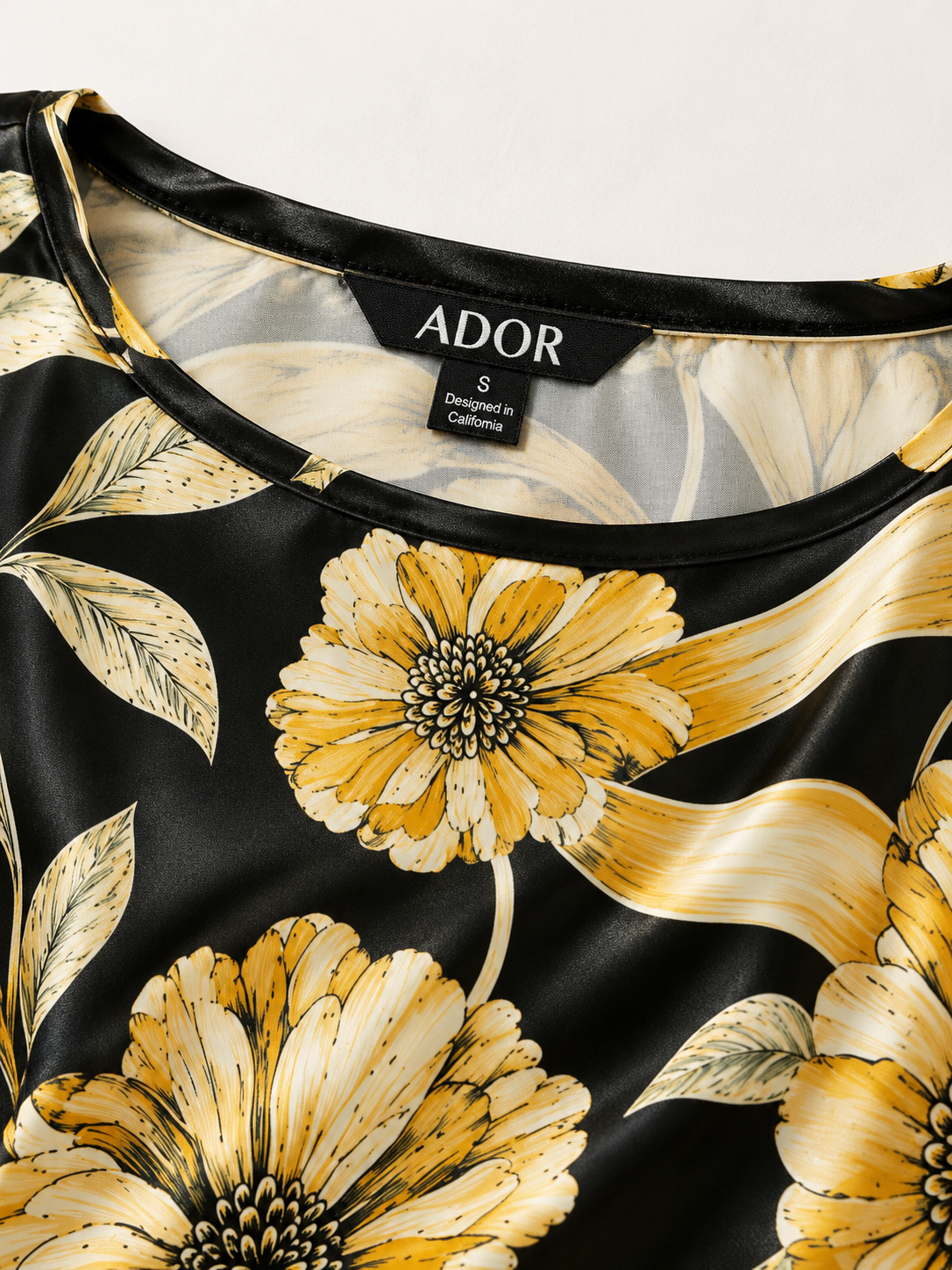 ADOR brand label detail on Cream Yellow Petal Satin Dolman Sleeve Top