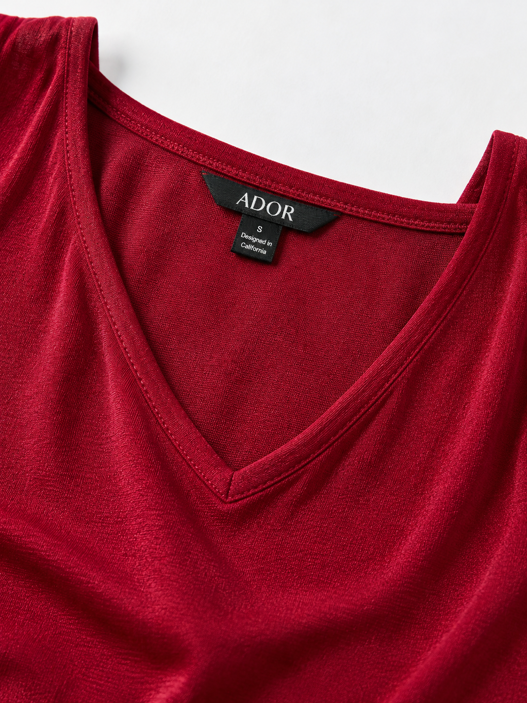 ADOR brand label detail on Acetate Look Stretch Knit Convertible Tank