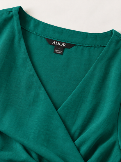 ADOR brand label detail on Tencel Linen Shirred Wrap Midi Dress