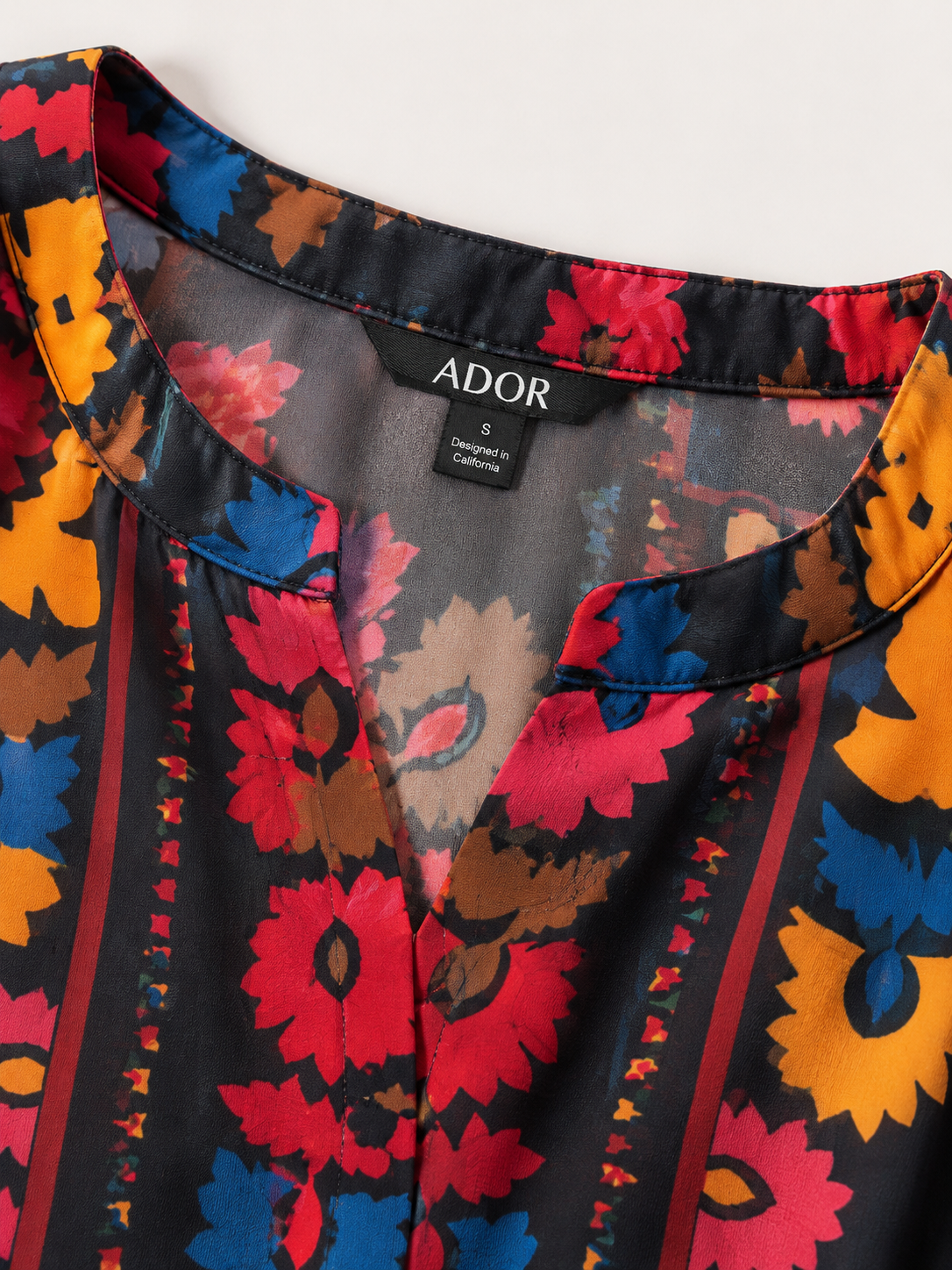 ADOR brand label detail on Flowy Chiffon Floral Print Lapel Ethnic Style Top