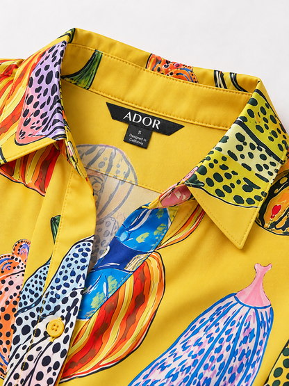 ADOR brand label detail on Asymmetrical Hem Pumpkin Print Shirt Dress