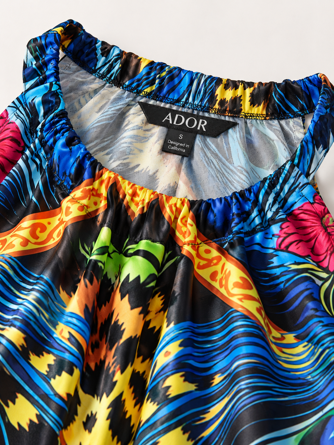 ADOR brand label detail on Jungle Wild Party Silky Leopard Maxi Dress