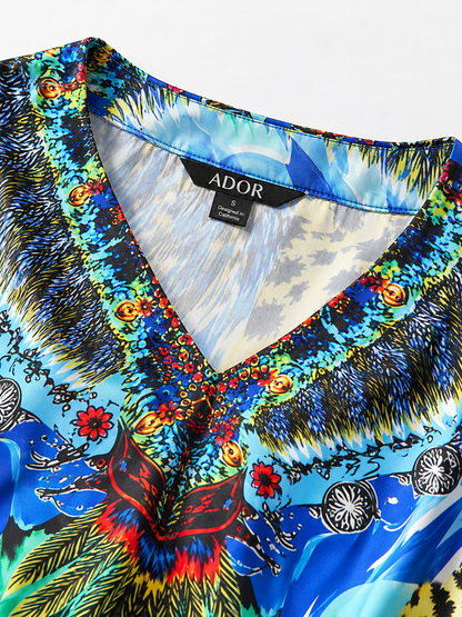 ADOR brand label detail on Jungle Wild Party Silky Satin Leopard Batwing Top