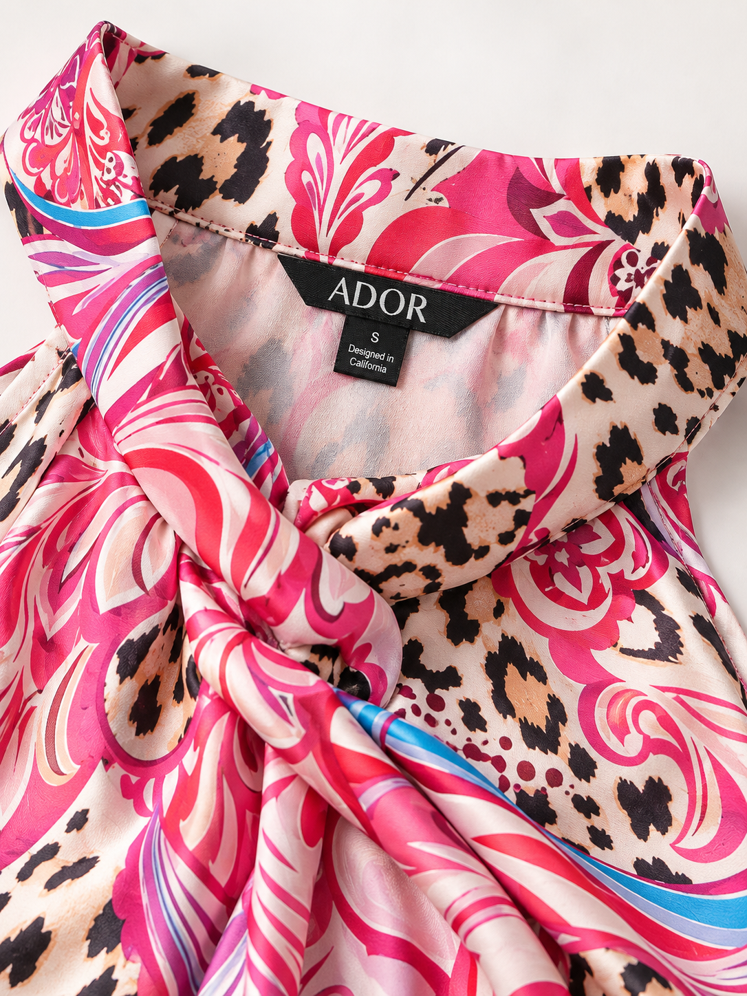 ADOR brand label detail on Blush&Beast Silky Satin Pink Paisley Sleeveless Top