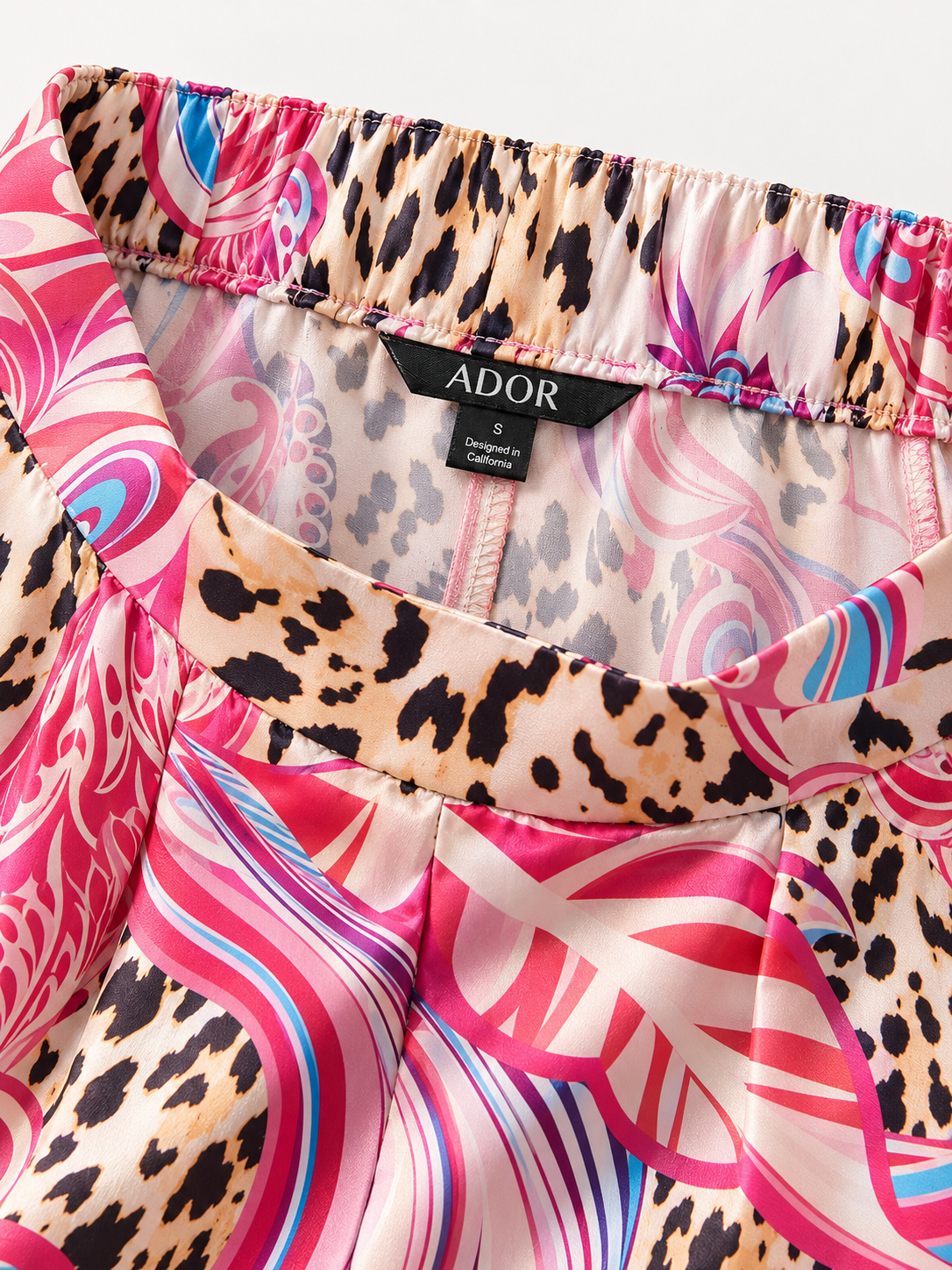 ADOR brand label detail on Blush&Beast Silky Satin Pink Paisley Pants
