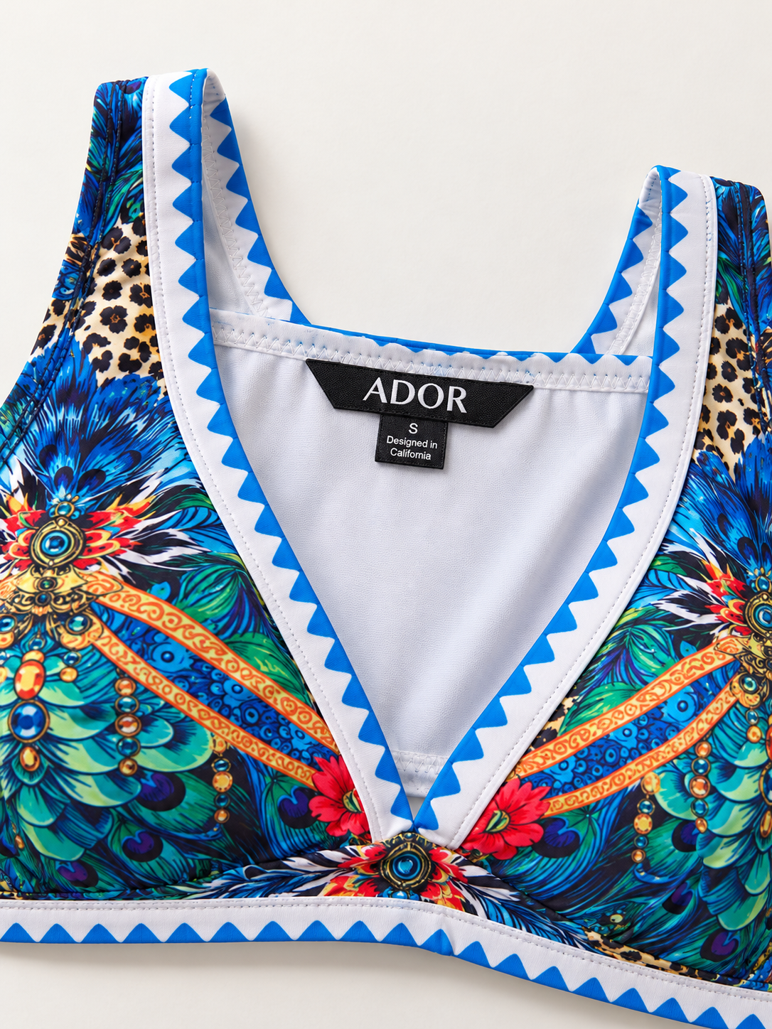 ADOR brand label detail on Jungle Wild Party Stretch Two-Piece Swimsuit