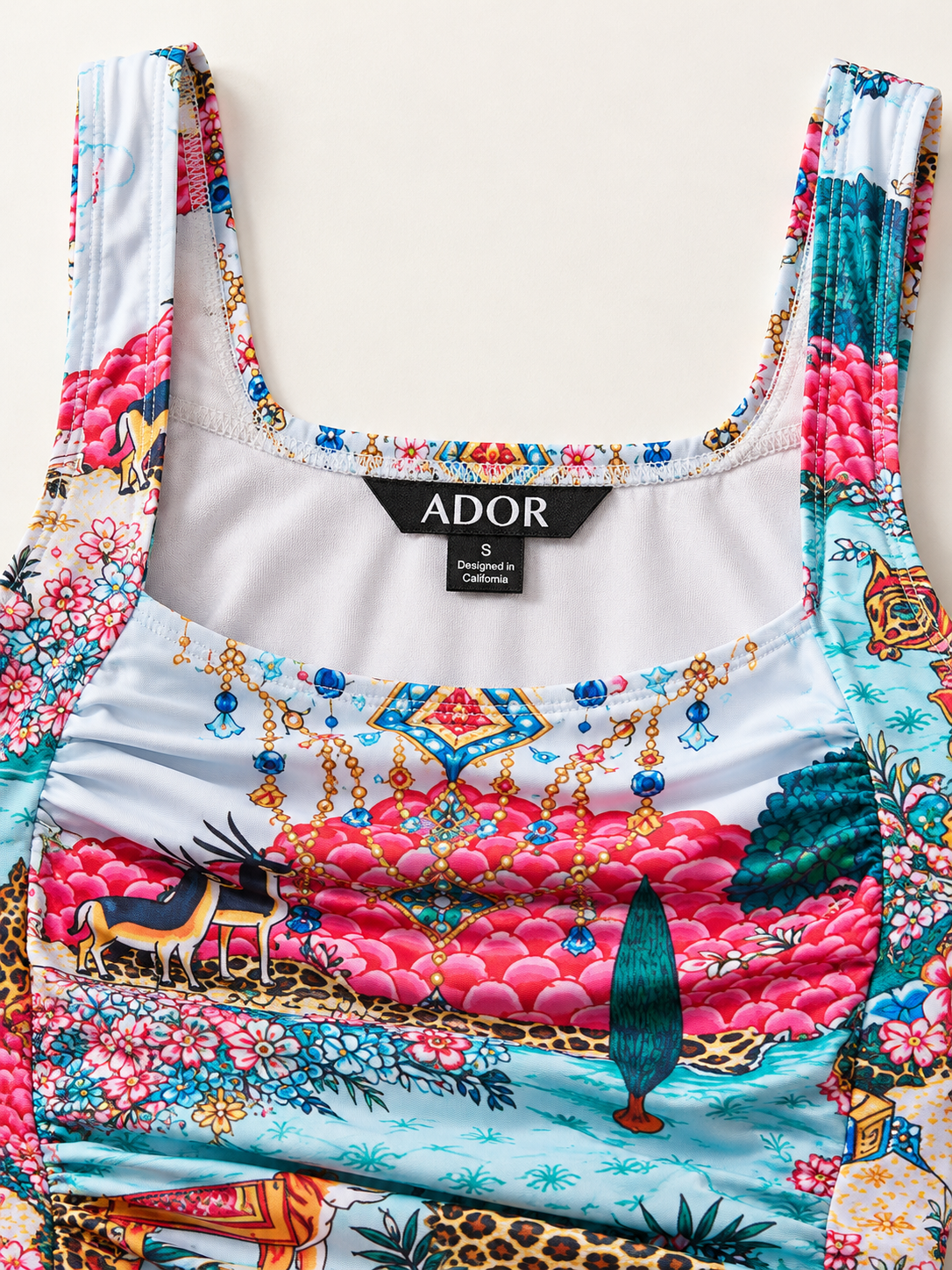 ADOR brand label detail on Dream Village Vacation One Piece Swimsuit