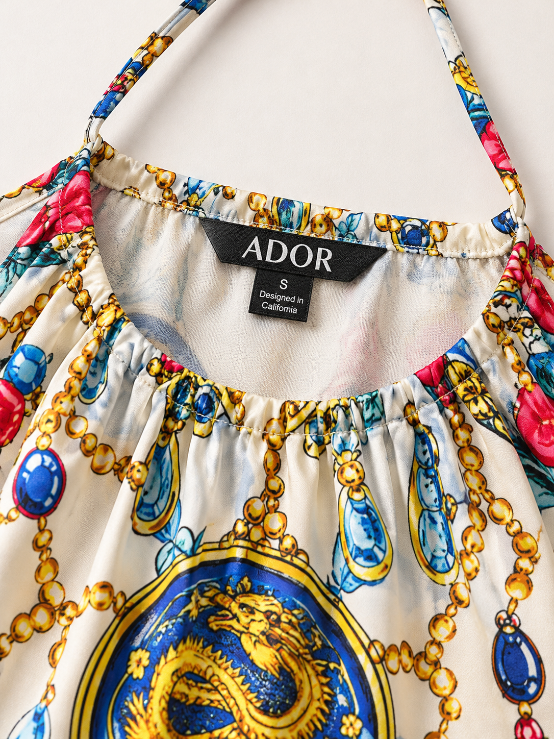 ADOR brand label detail on Dream Village Silky Satin Vintage Maxi Dress