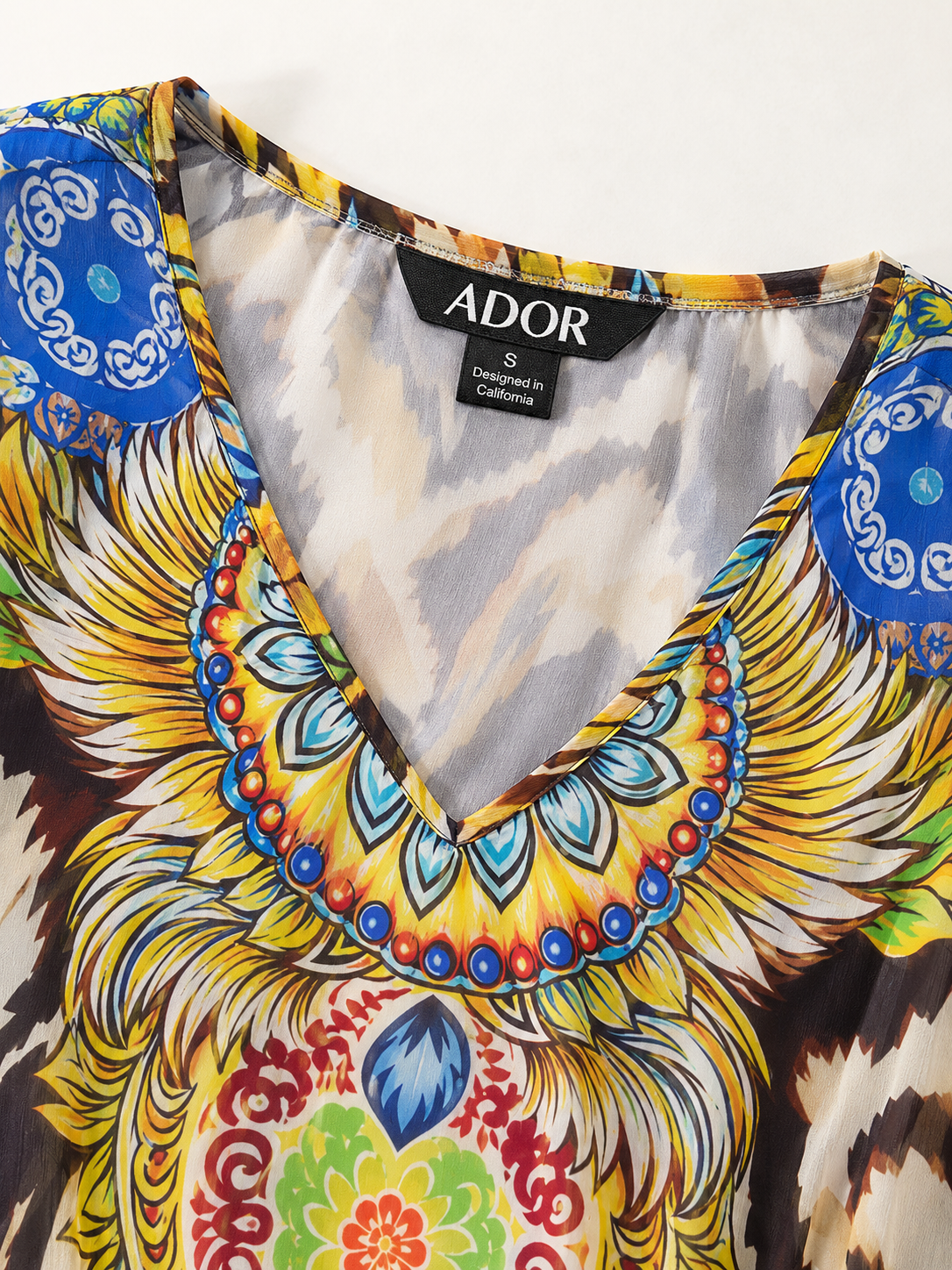 ADOR brand label detail on Gradient Tiger Flowy Chiffon Maxi Dress