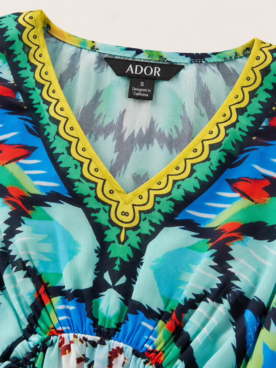 ADOR brand label detail on Land of Wonder Vacation Chiffon Kaftan