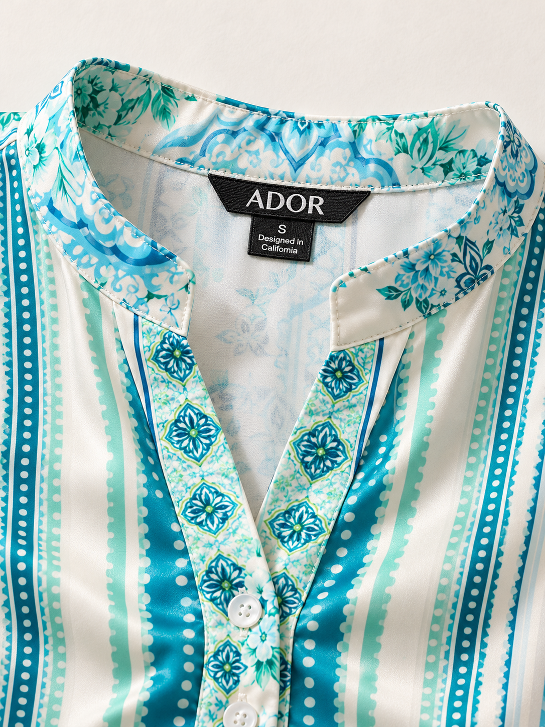 ADOR brand label detail on Celadon Bloom Story Silky Satin Maxi Dress