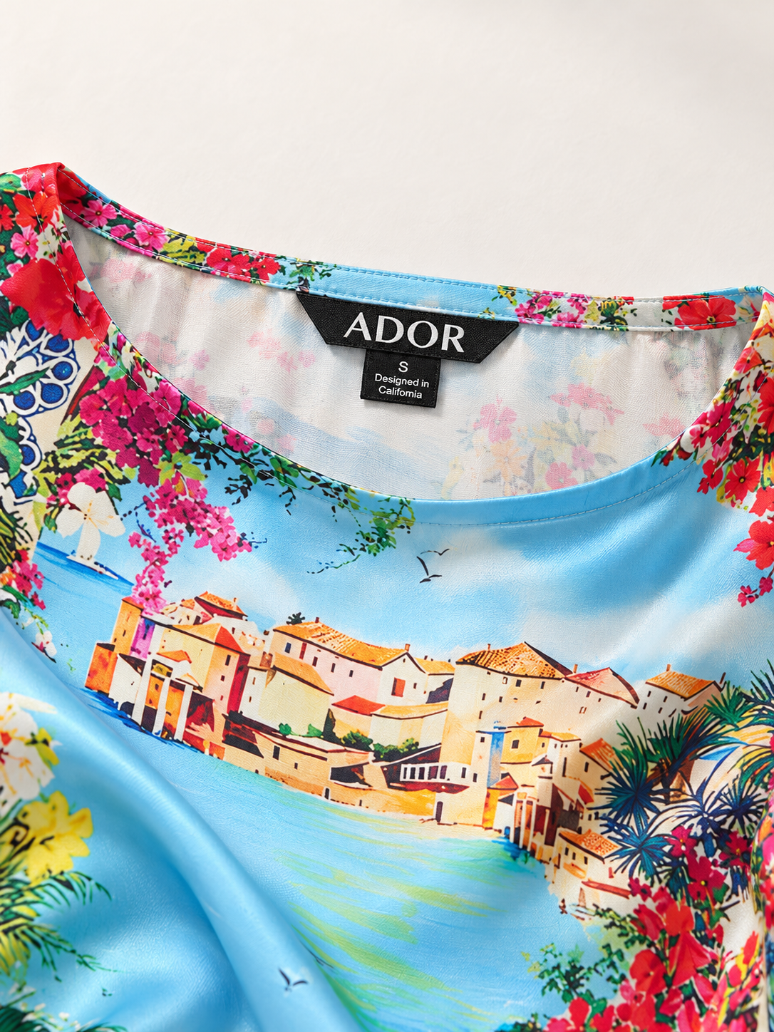 ADOR brand label detail on Mallorca Blossom Silky Satin Dolman Sleeve Batwing Top