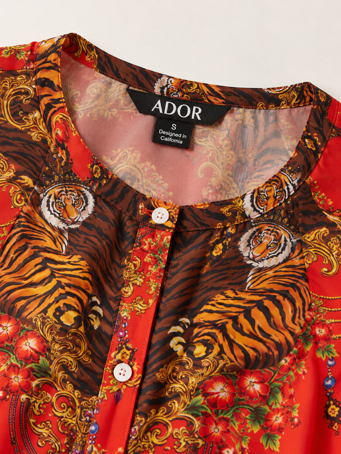 ADOR brand label detail on Scarlet Tigress Flowy Chiffon Dolman Sleeve Shirt