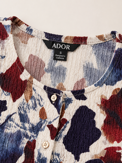 ADOR brand label detail on Floral Stretch Fabric Top