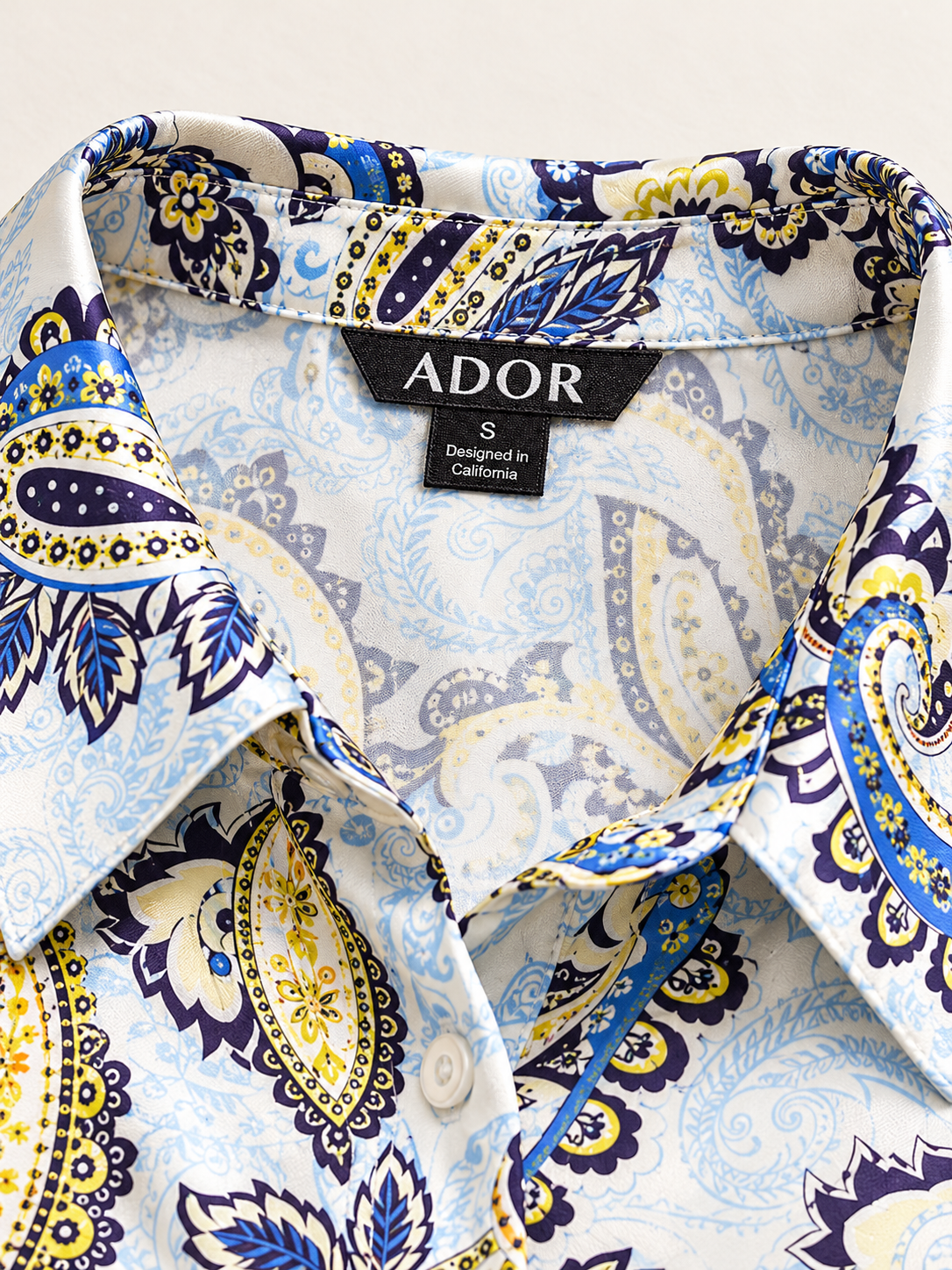 ADOR brand label detail on Skyline Paisley Flora  Silky Satin Shirt Dress