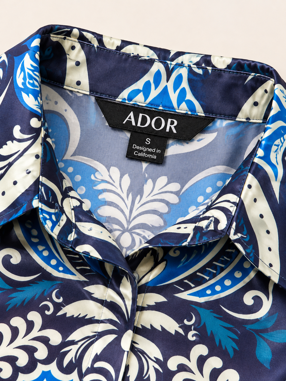 ADOR brand label detail on Azure Palace Harmony Silky Satin Dolman Sleeve Top