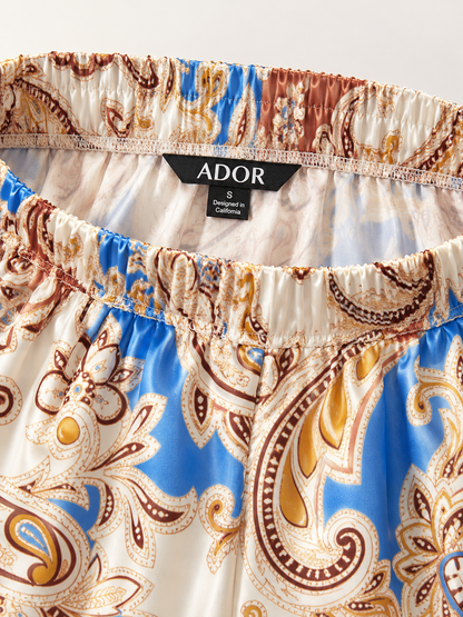 ADOR brand label detail on Royal Paisley Flora Satin Wide Leg Pants