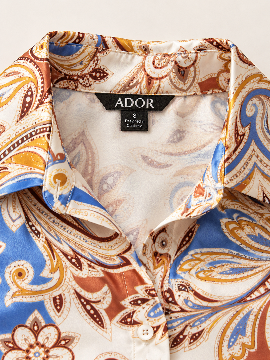 ADOR brand label detail on Royal Paisley Flora Silky Satin Shirt Dress