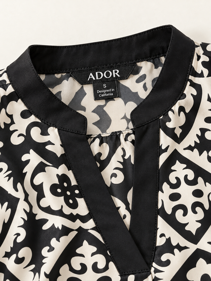 ADOR brand label detail on Satin Eden Moroccan Black and White Printed Blouse