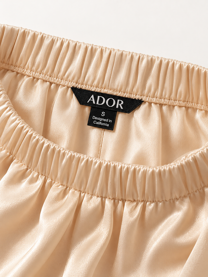 ADOR brand label detail on Silky Satin Apricot Elastic Waist Wide Leg Pants