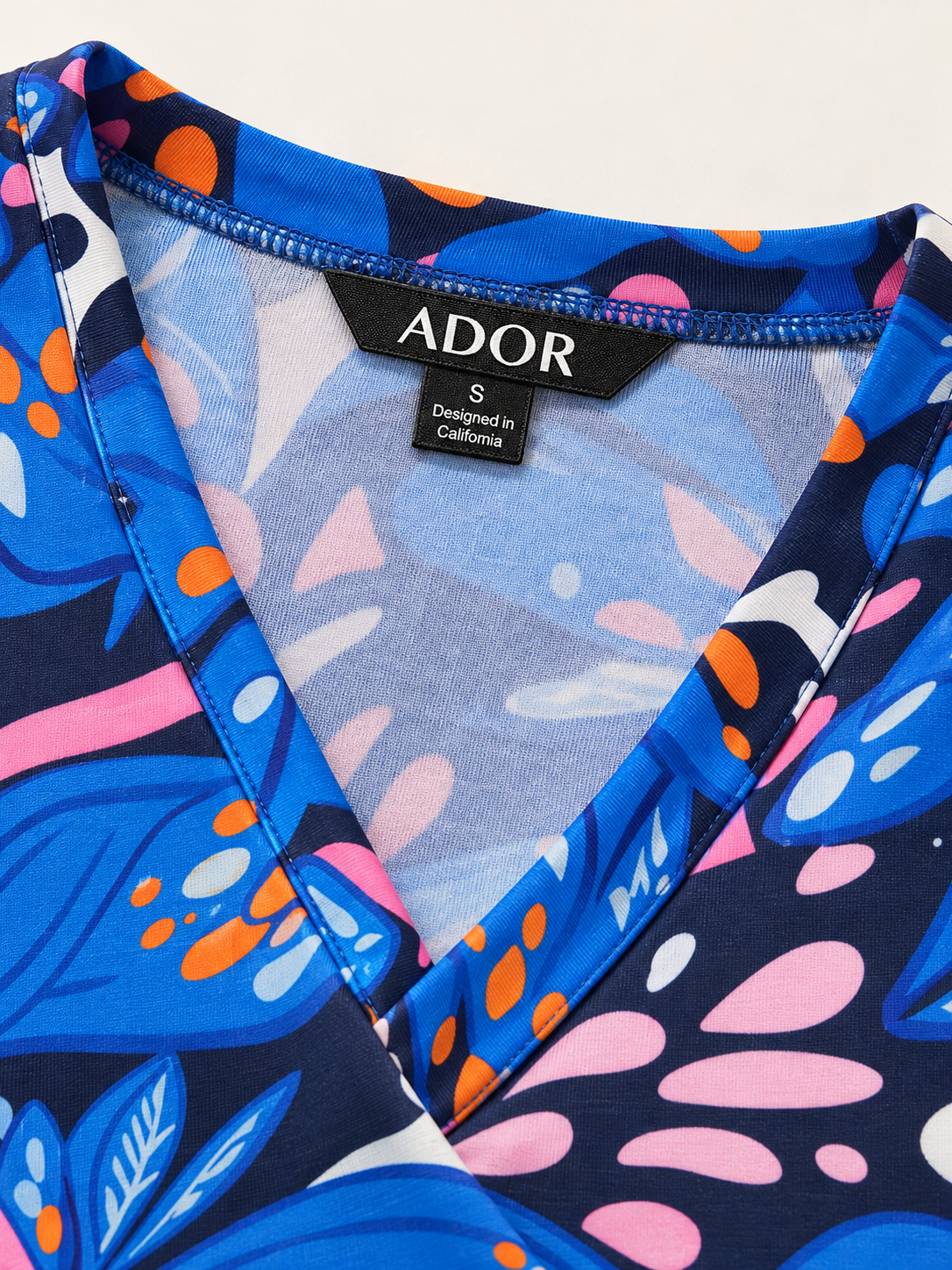 ADOR brand label detail on Abstract Azure High Stretch Knit Dress
