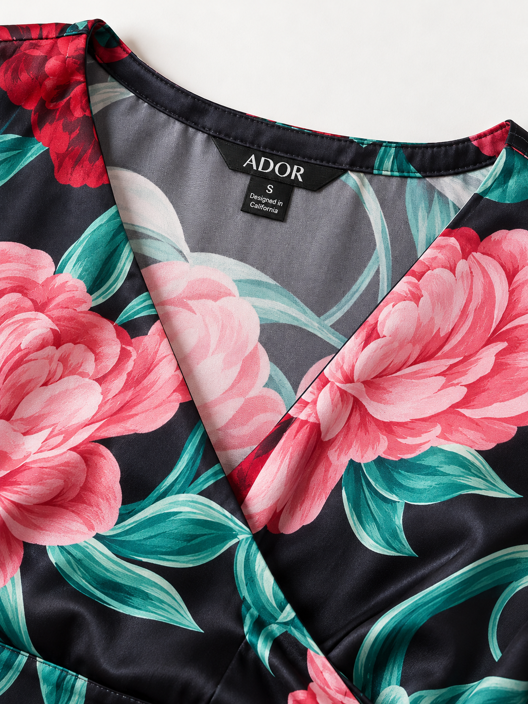 ADOR brand label detail on Emerald Rose Garden Silky Satin Floral Maxi Dress
