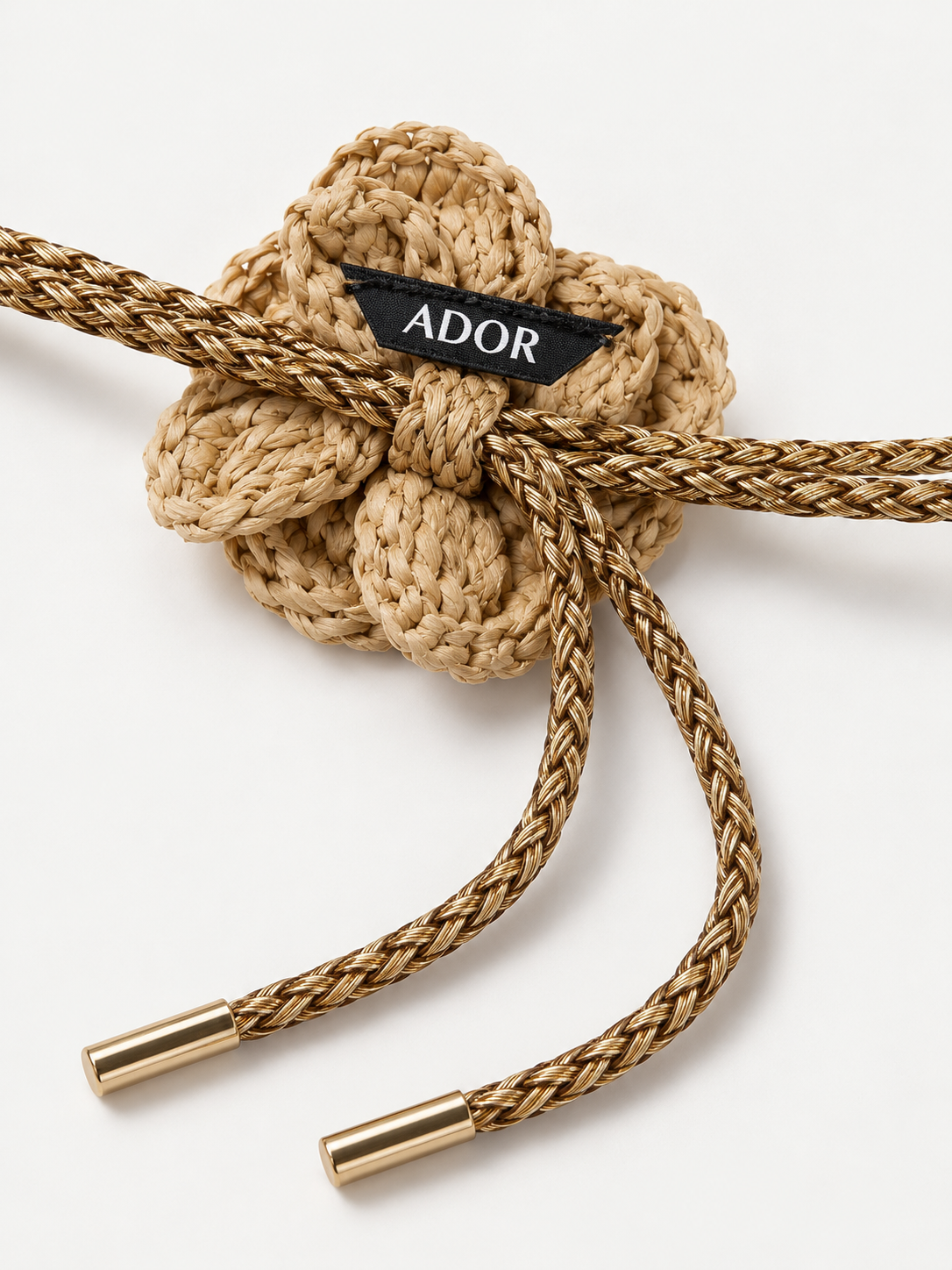 ADOR brand label detail on Boho Handcrafted Raffia Flower Belt