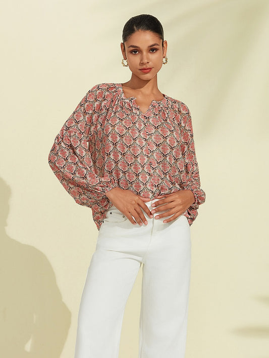 Blouse décontractée en mousseline à manches bouffantes géométriques