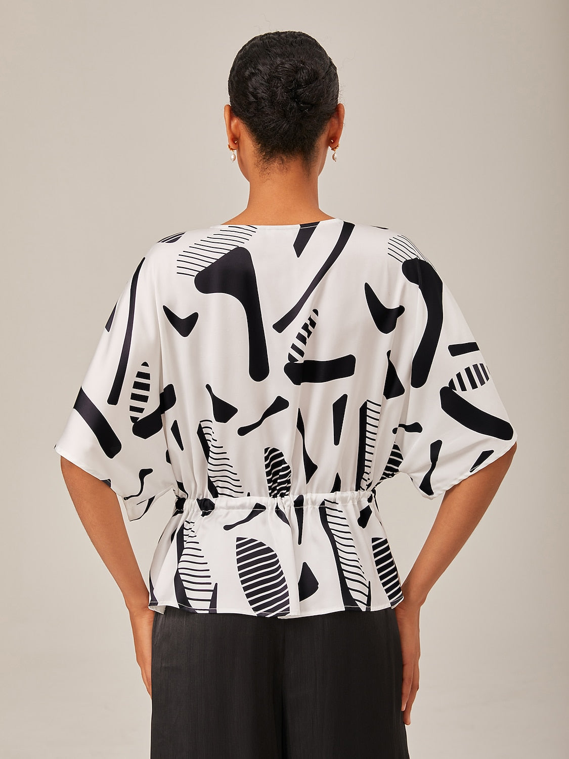 Geometric Ruched Dolman Sleeve Top