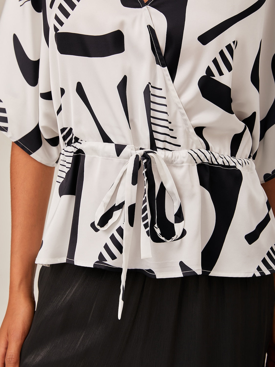 Geometric Ruched Dolman Sleeve Top