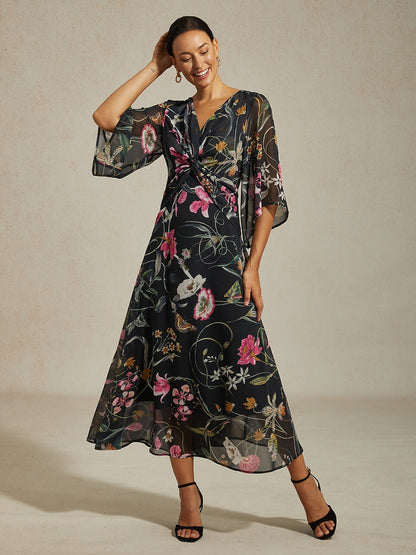 Robe maxi en mousseline à imprimé floral abstrait vert et nœud torsadé