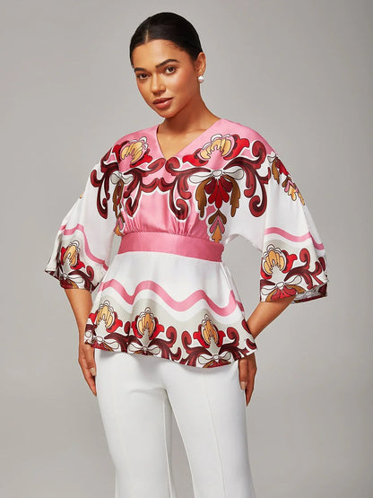 Top de satén con estampado floral rosa