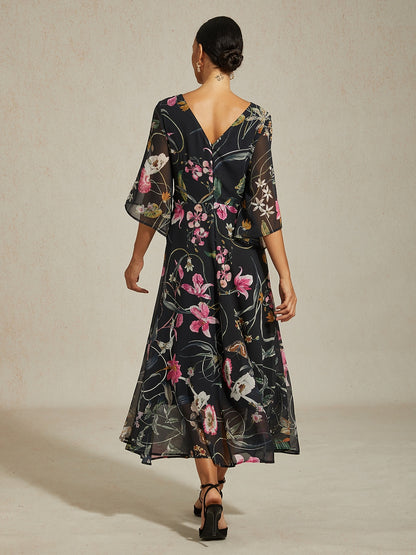 Robe maxi en mousseline à imprimé floral abstrait vert et nœud torsadé