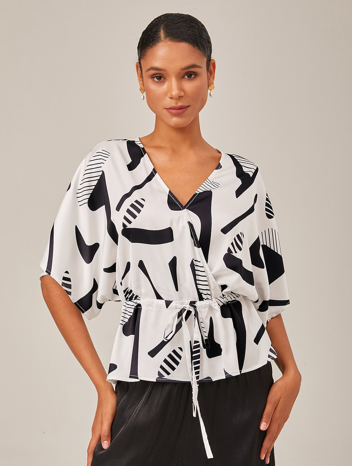 Geometric Ruched Dolman Sleeve Top