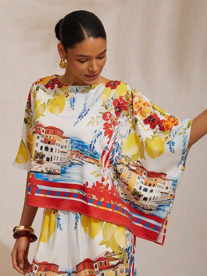 Traumhaftes Oberteil aus seidigem Satin mit Fledermausärmeln und Wildem Hibiskus-Muster