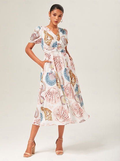 Leinenähnliches, gesmoktes Midikleid mit Muschelmuster