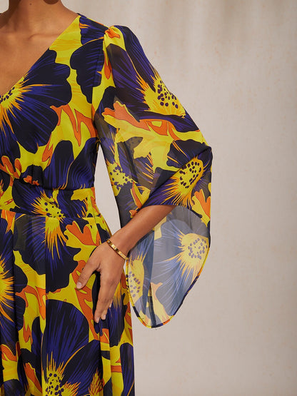 Robe maxi en chiffon à imprimé floral et manches évasées